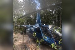 Helicóptero de R$ 4 milhões é encontrado escondido em área de mata no Amajari
